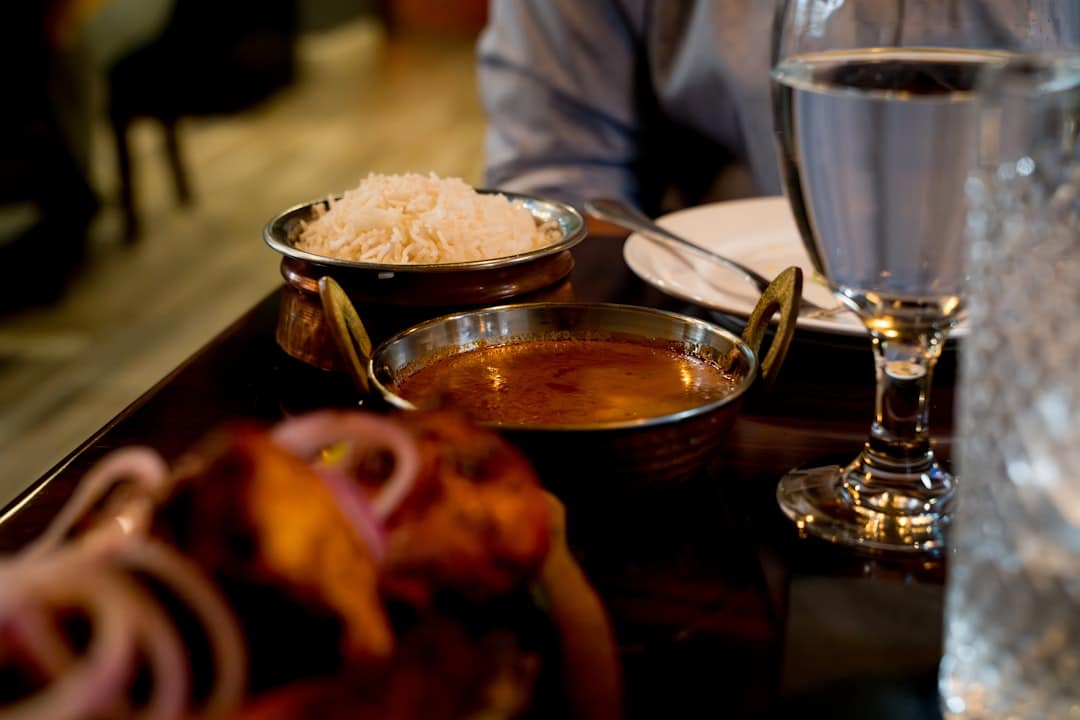 Indian fusion cuisine vibrant dish with traditional spices and modern presentation - indian fusion near me